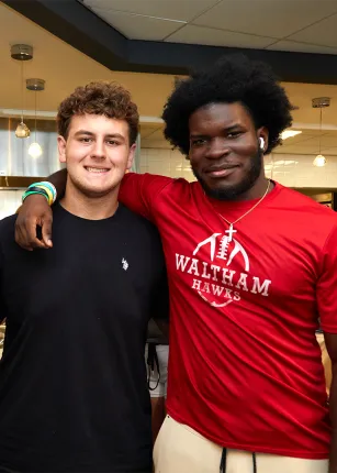 Two students pose together