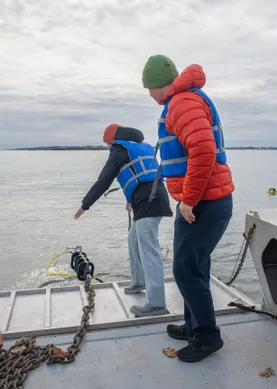 Student Lexi De Gree drops the buoy's anchor
