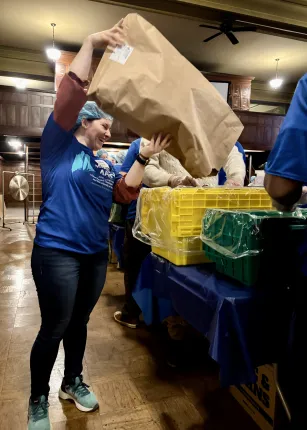 Since starting in 2023, UNE’s large-scale, meal-packaging effort had produced 300,000 meals for individuals and families throughout the state; Wednesday’s event brought that number to 350,000. The Masonic foundation joined the effort last fall to help the program reach all 16 counties in Maine for the first time.  UNE Service Learning Director Trisha Mason said in her opening remarks that the Meals for Maine partnership with the Masons typifies UNE’s experiential-learning approach to education by providing 