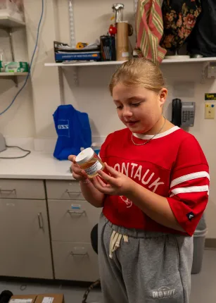 Assistant Professor Tricia Thibodeau and third-year marine science major Piper Stagg took time to lead a private tour of the Arthur P. Girard Marine Science Center for a 10-year-old aspiring researcher, carrying on a legacy of discovery throughout the next generation of scientists.