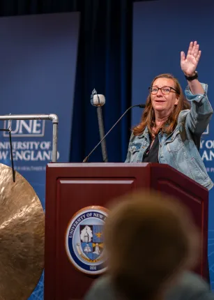 UNE, community volunteers pack a record 200,000 meal kits to combat hunger across Maine