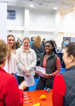 Students speak with job recruiters