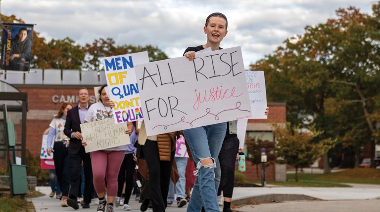 Students and President Herbert at the Women's March in 2021