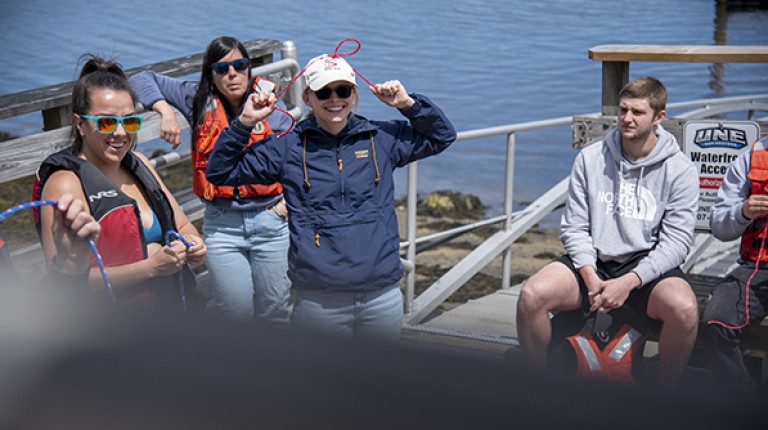 Students learn to tie various types of knots on the UNE dock