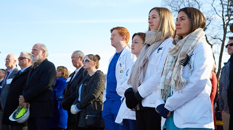 UNE health sciences students watch remarks