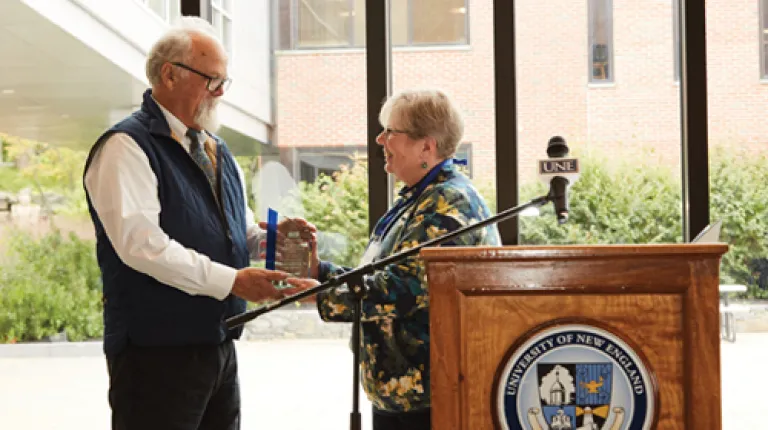 A St. Francis Alum receives an award