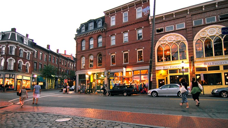 A street with brick buildings in downtown Portland, Maine
