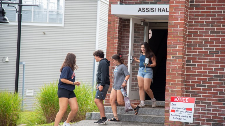 Students exit Assisi Hall
