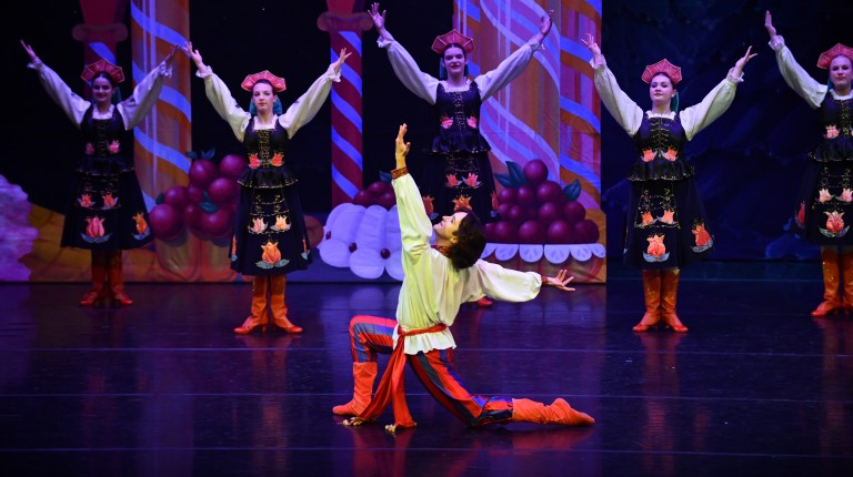 Trevor Seymour dances with cast-mates as The Russian Soloist in Maine State Ballet's "The Nutcracker"