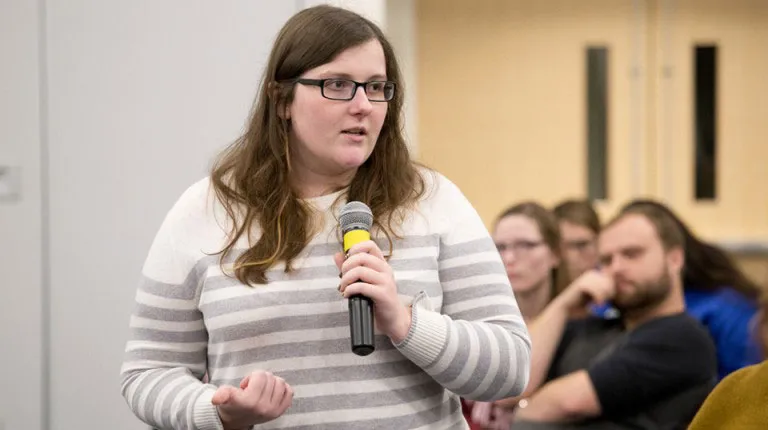 Student speaking at an event