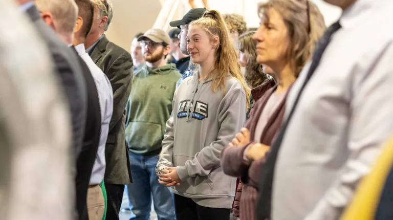 An audience watches speeches
