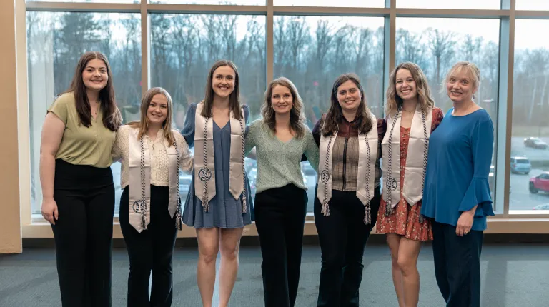 Current officers pose with UNE First Lady Lynn Brandsma