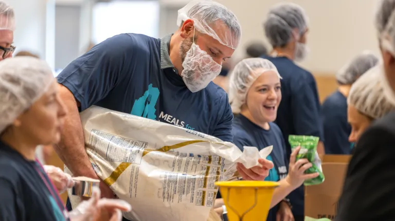 Meals for Maine volunteers prepare meal kits on Sept. 18 to help combat food insecurity.