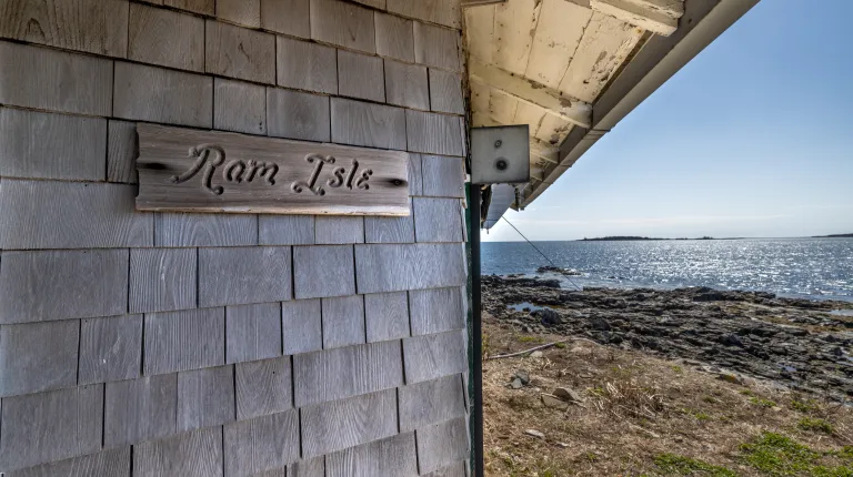 UNE team of students and faculty install seismometer on Ram Island