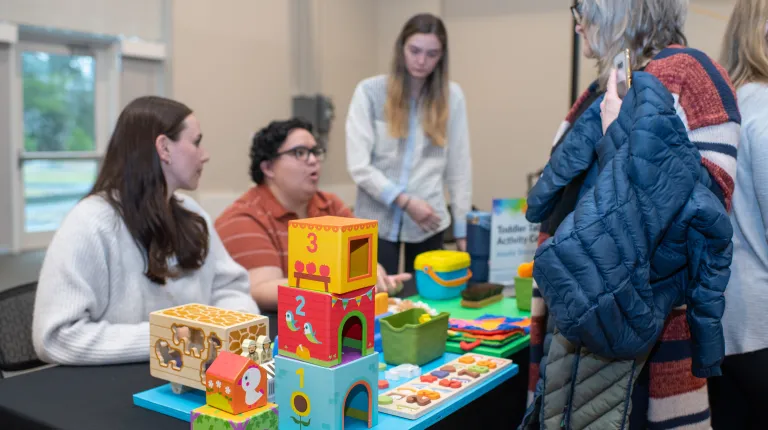 Students show off their custom-made sensory children's toys