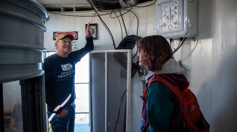 Reiche shows Dyer the lighthouse interior