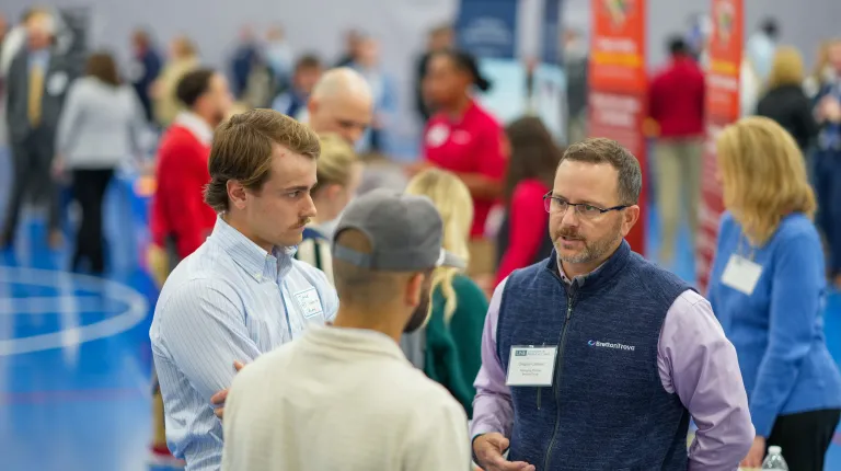 UNE students meet with employers at a career fair
