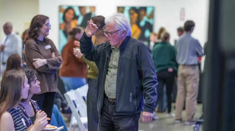 David shaw speaking to students after the event