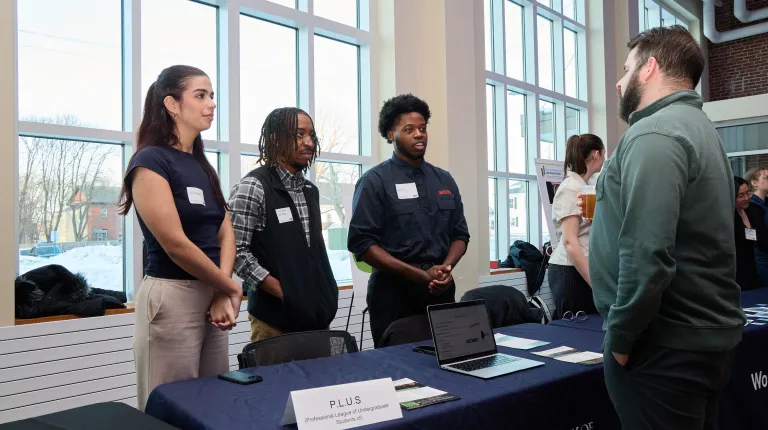 UNE students table for their organization in Innovation Hall