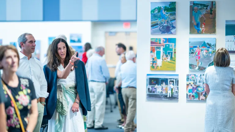 Spectators view gallery artwork