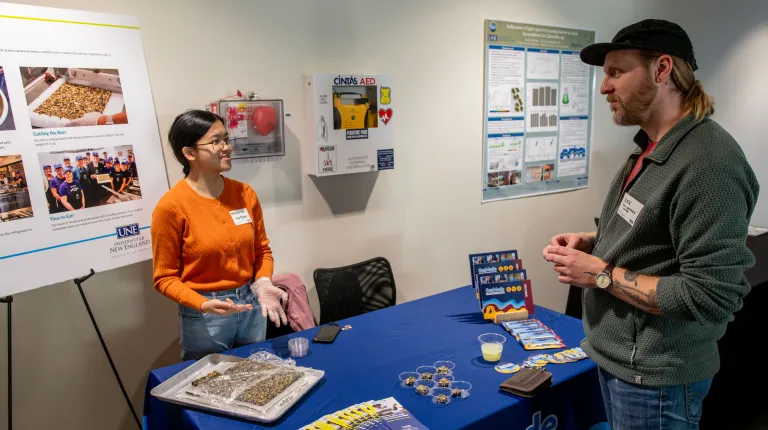 A student presents her work on UNE's SeaMade Kelp Bar initative