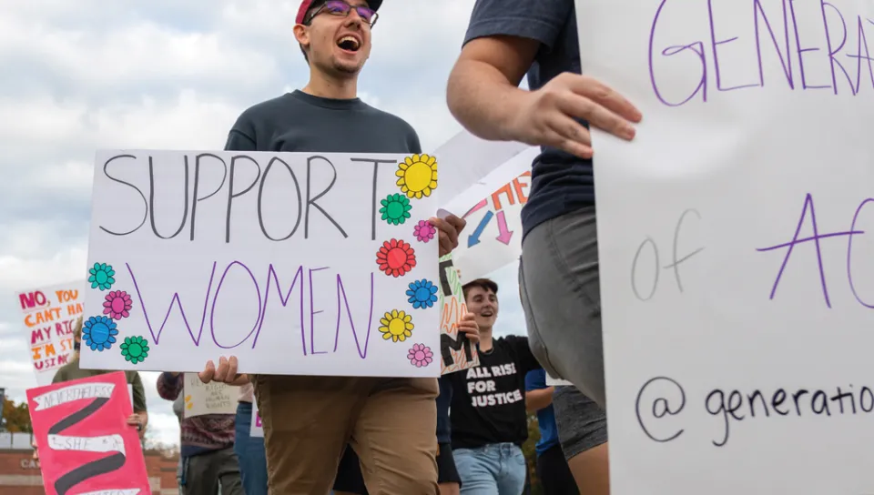 U N E student at the Women's March 2021