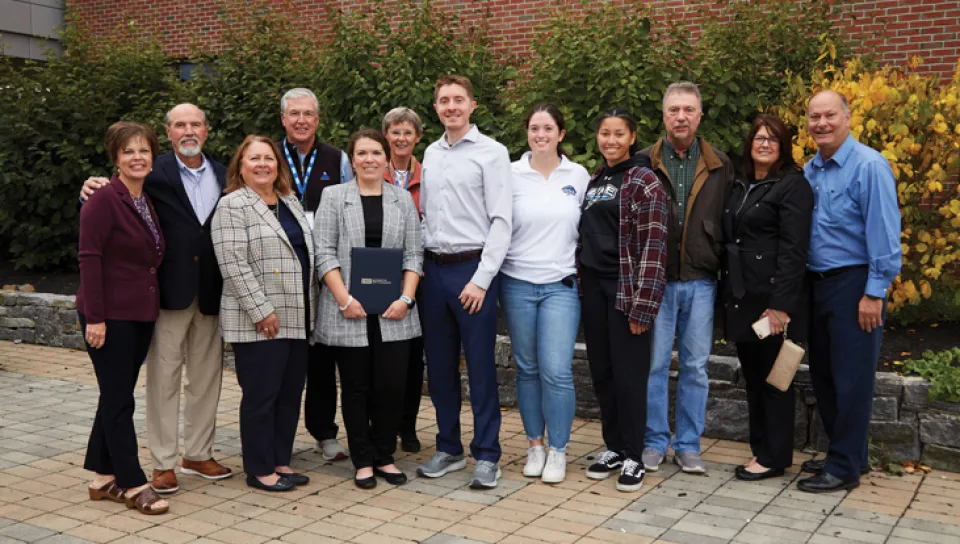 St. Francis Alum standing together at the U N E 2022 Homecoming Weekend