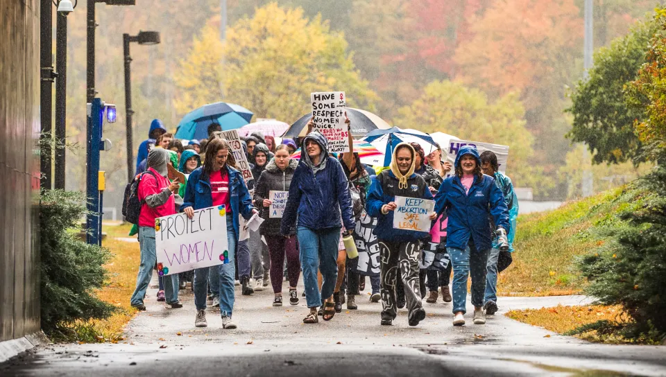 Students march through the campus tunnel at the 2nd annual Women's March