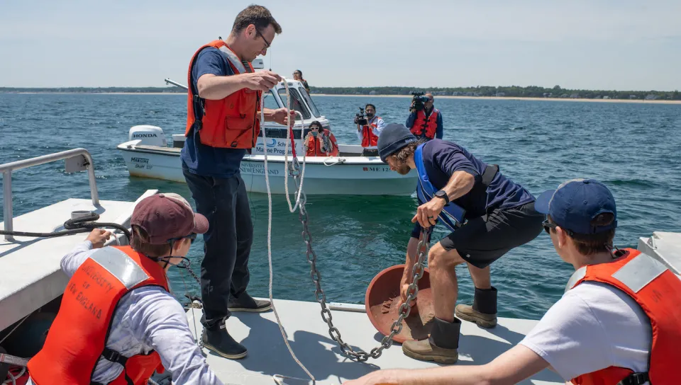 Students and faculty deploy a real-time shark detection buoy in Saco Bay
