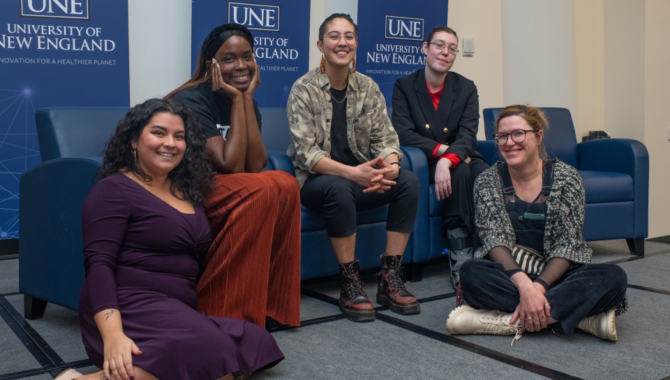 The panelists pose with UNE Director of Intercultural Student Engagement Andrea Peredes