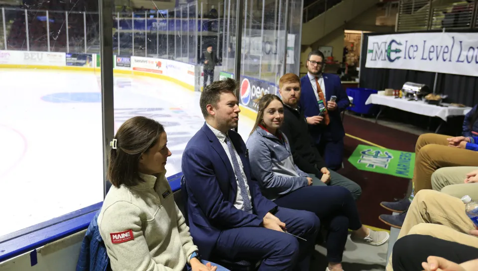 A panel featuring of local sports and recreation professionals speaks to business students