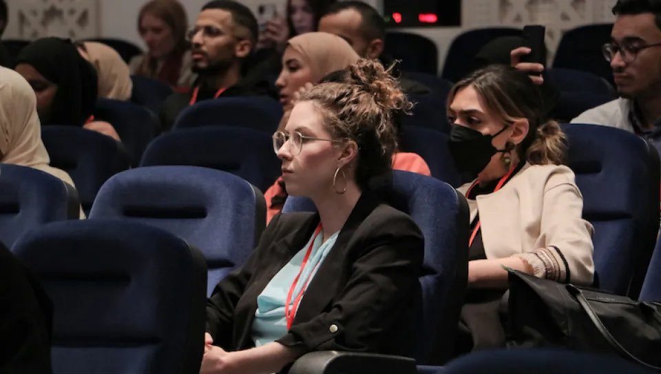 Photo of students sitting in an auditorium on the Tangier campus