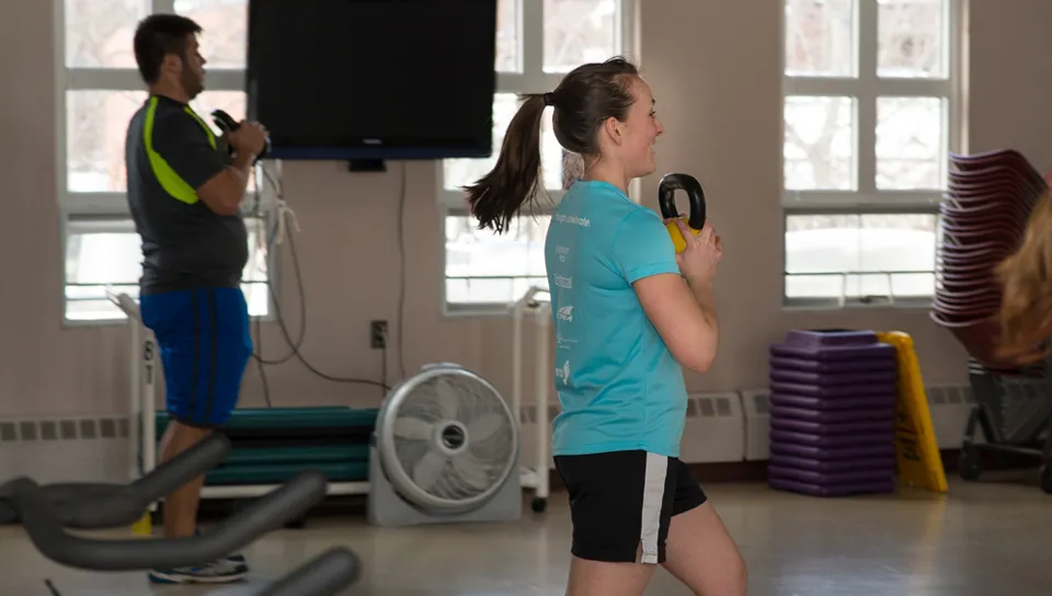 Graduate students participating in an exercise class