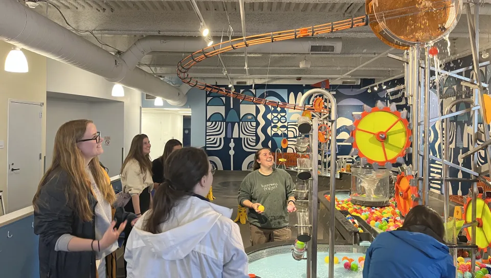 Students play with water mechanisms at the Children's Museum in Portland