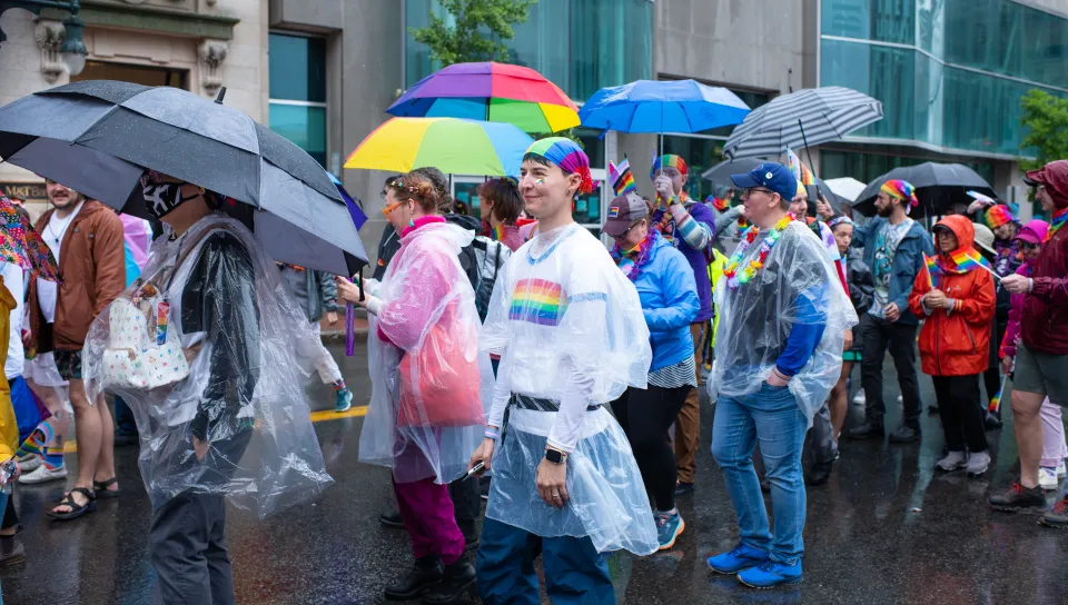 UNE community members march up Congress Street