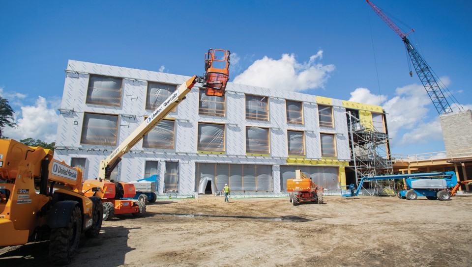 Exterior of the construction of U N E's new Harold and Bibby Center for Health Sciences building
