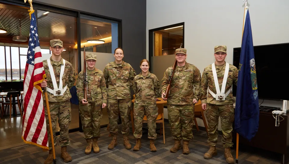 Members of the Army ROTC pose for a photo 