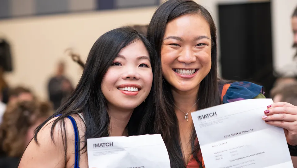 Two female students celebrate their residency matches