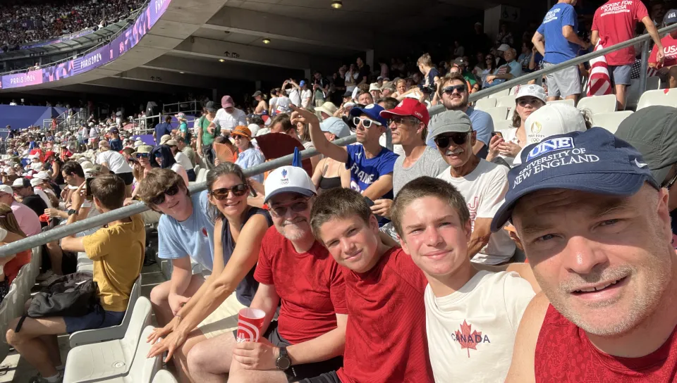 Norm O'Reilly poses with family inside the Olympic Stadium