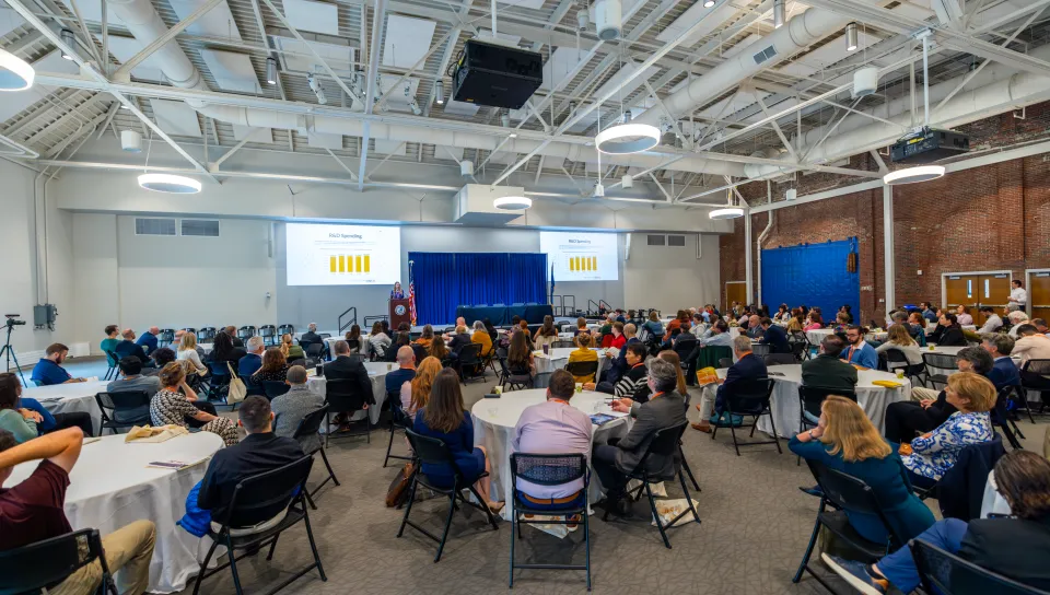 Innovation Hall at UNE is filled with conference attendees