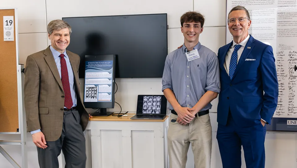 Sylvain Jaume, Shane Woloszyn, and James Herbert pause for a photo