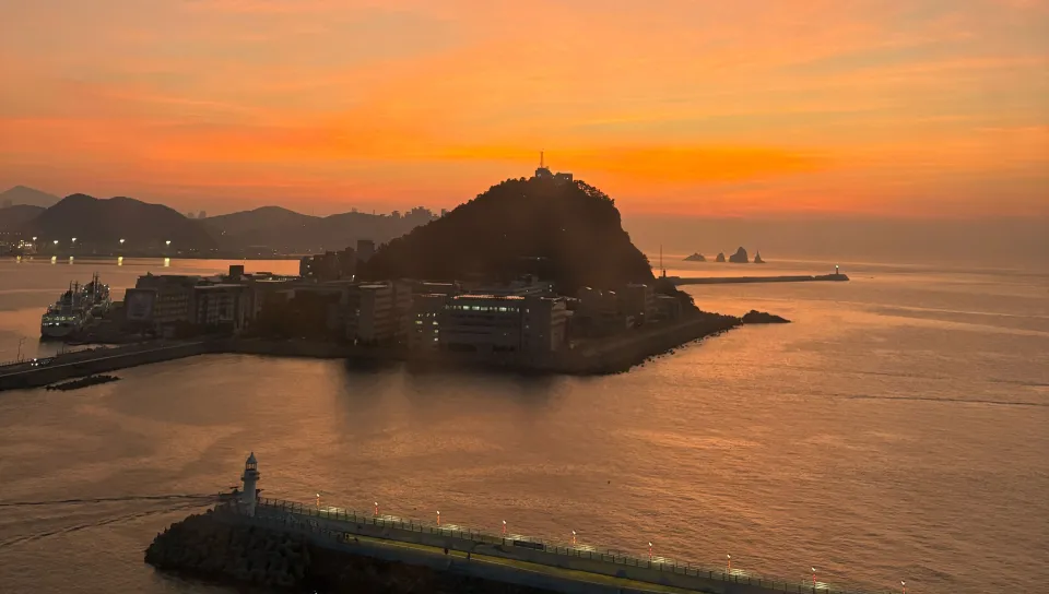 A sunset over the Busan harbor