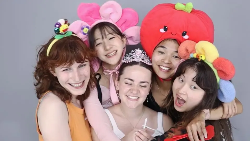 Shauna Curran and friends take a selfie in a photo booth