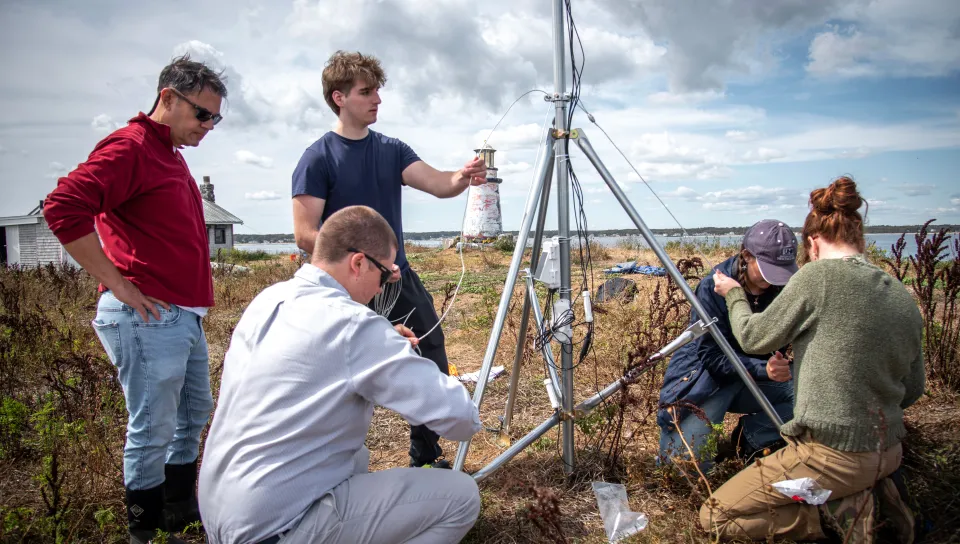 Researchers set up the weather station on Ram Island