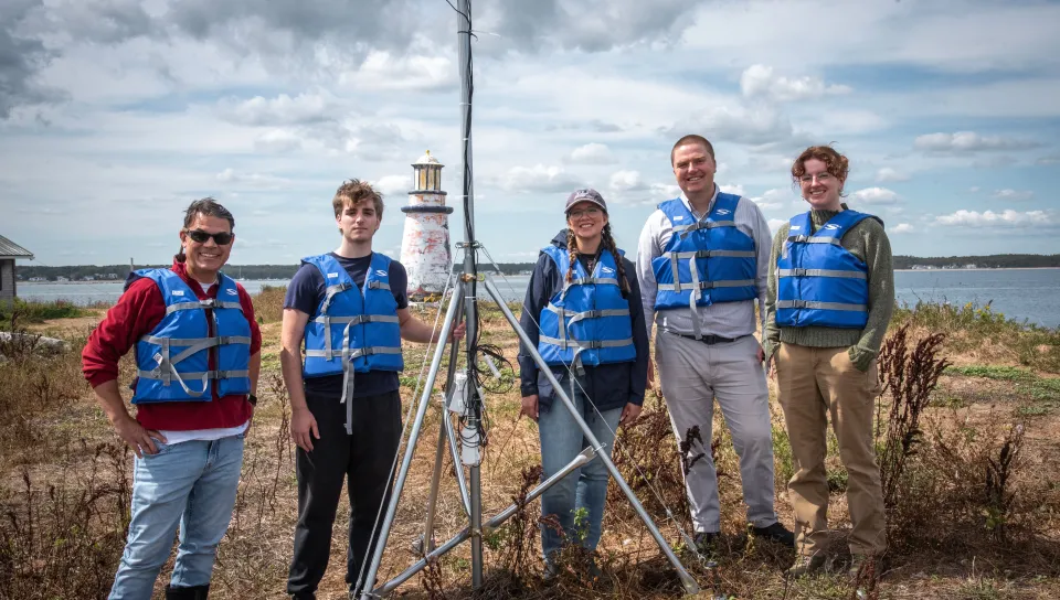 The full research team poses for a group photo on Ram Island