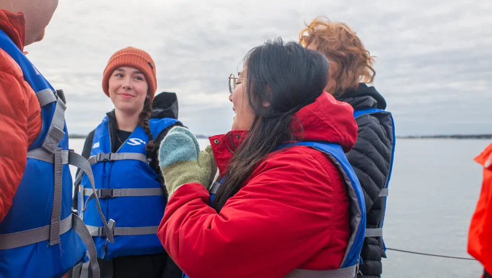  Jasmin Townsend-Ng (’26) claps while the team celebrates buoy deployment