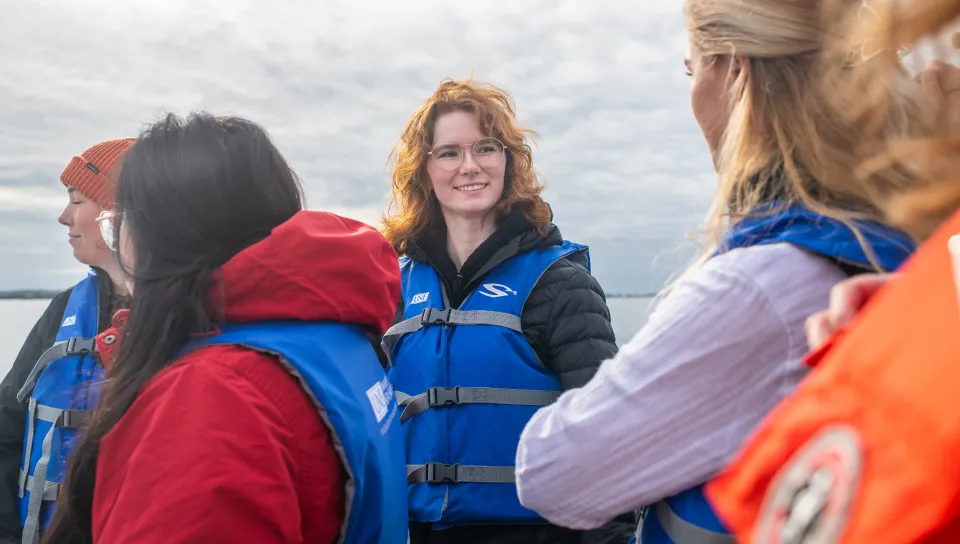 UNE student Elizabeth O'Brien smiles while on a UNE boat