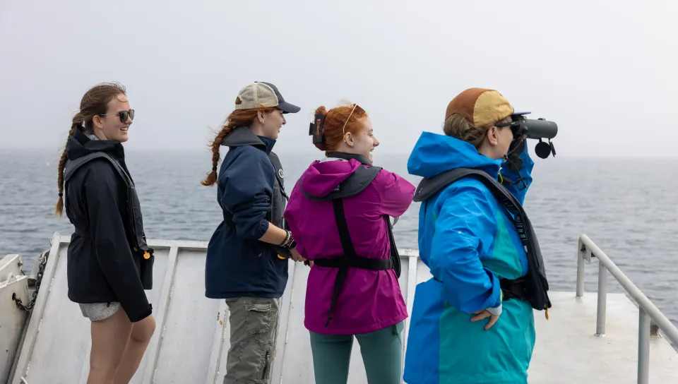 Kara Mickiewicz ’27 with Michelle Caputo, Ph.D. and other students in the Marine Mammals Lab