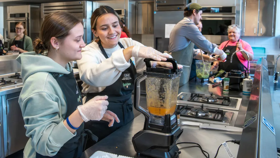 UNE occupational therapy students perform an exercise preparing blended foods for patients with limited swallowing capabilities