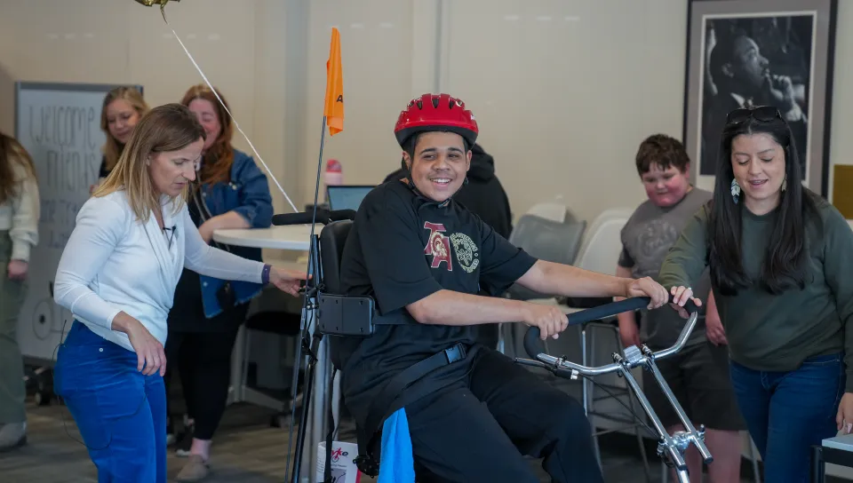 UNE students foster mobility access for locals with disabilities at adaptive bicycle fitting